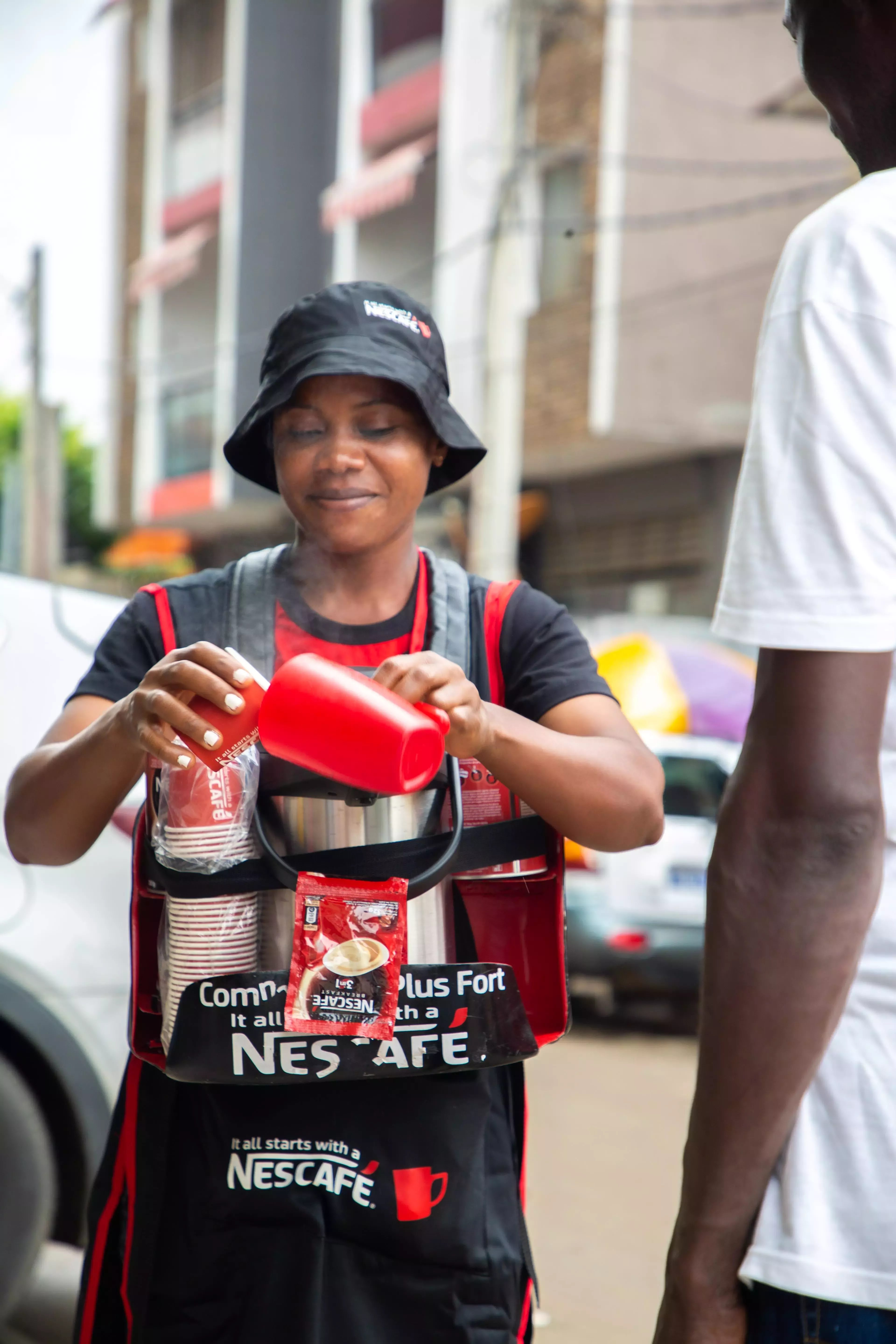 female coffee seller in Côte d'Ivoire